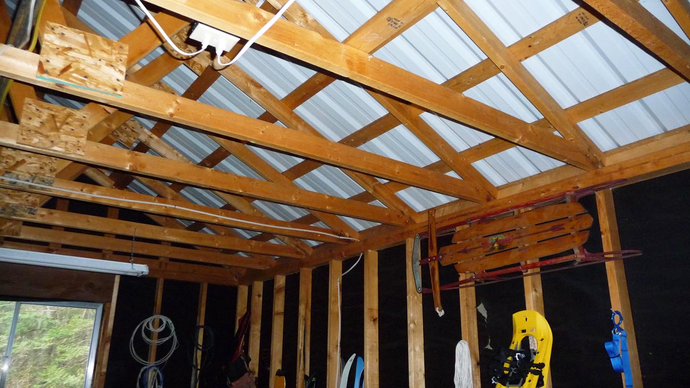 garage rafters insulation insulate ceiling storage barrier vapor properly shed bike stackexchange options